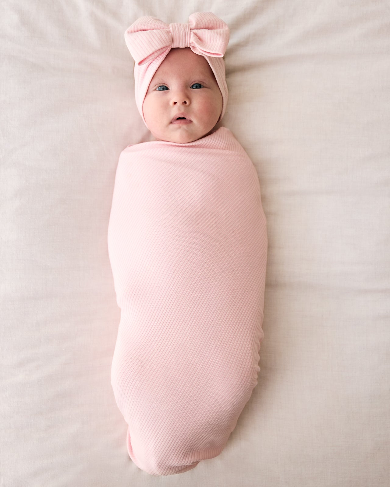 Prima Pink Ribbed Swaddle & Luxe Bow Headband Set