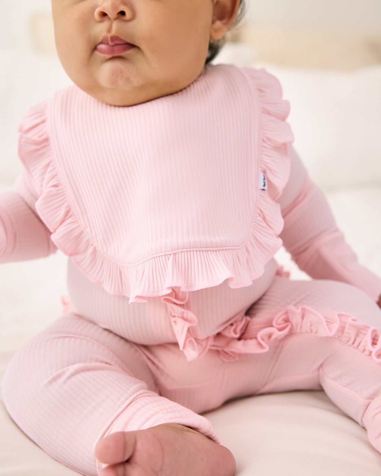 Prima Pink Ribbed Ruffle Bib